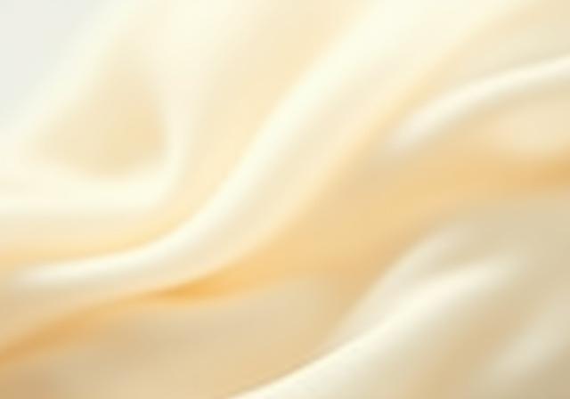 繊細で光沢のある日本のシルク繊維のクローズアップ。極上の絹